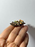 Miniature sushi 1:12 scale on wooden board