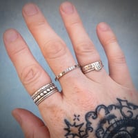 Image 6 of ‘Echo’ hand stamped Sterling Silver Stacking Ring - sunburst pattern