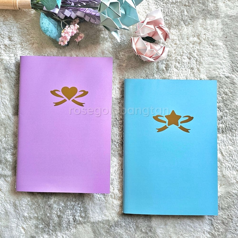 Image of heart x star sticker collection books