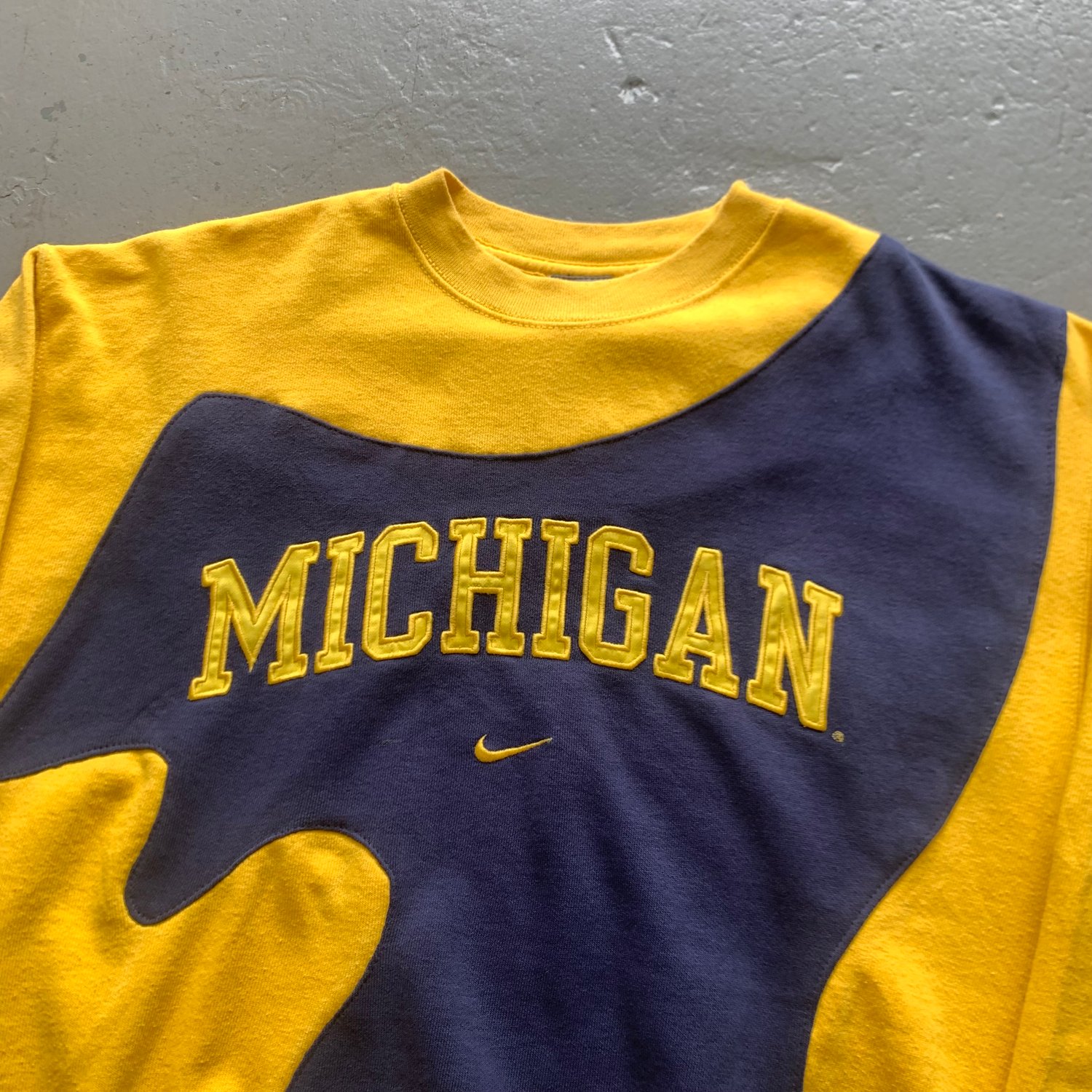 Image of Vintage 90s Nike rework sweatshirt size small Michigan centre swoosh 