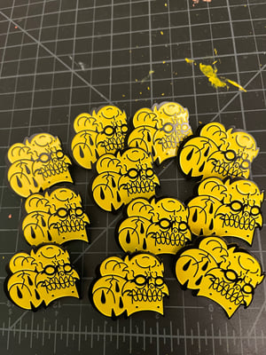 Image of Yellow Enamel skull pin 