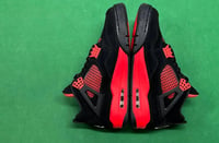 Red thunders Jordan 4 