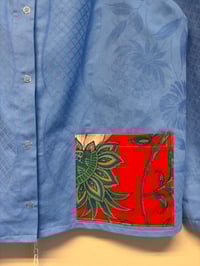 Image 4 of Blue shirt with flowers (m/l)