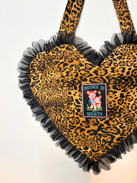Image 3 of Heart-Shaped Leopard Print Bag – “Menace to Society” Patch with Black Ruffle Edge