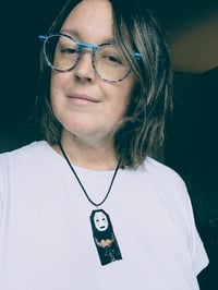 Image 2 of No Face necklace