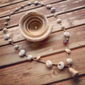 Image of Hawaiian puka shell wrap necklace