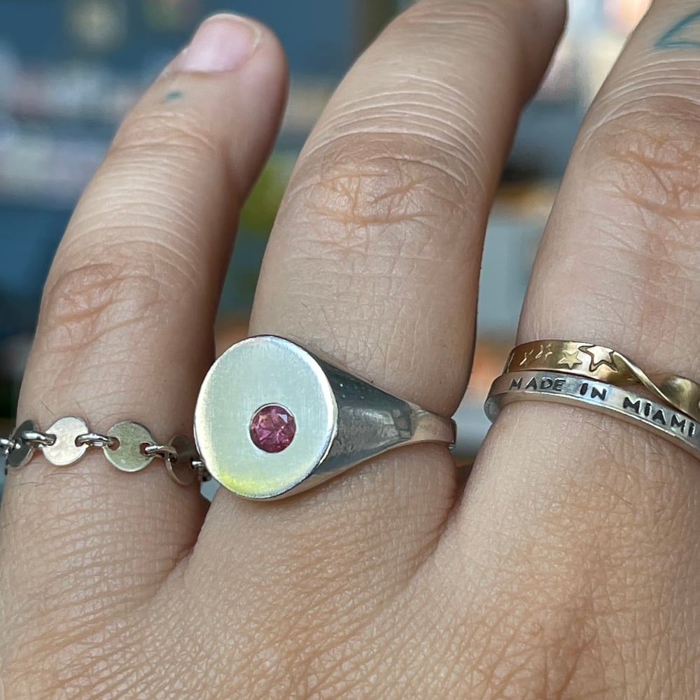 Image of pink dot signet ring