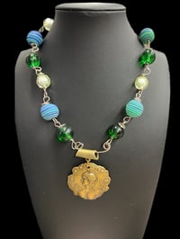 Swirl Beads Bintage with Medallion 