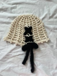 Image 2 of black lace up beanie 