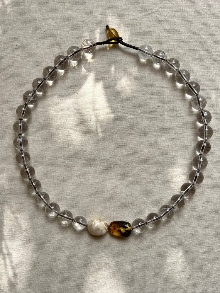Image of Necklace with clear quartz, shell and amber