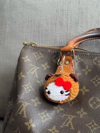Image 1 of Hello kitty capybara 