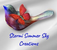 Image 1 of Bird with small Butterfly