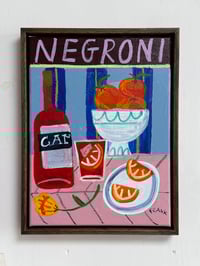 Negroni with orange slices (framed)