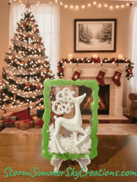 Image 1 of White Reindeer with Green Frame