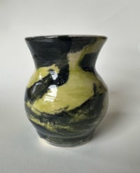 Green and black vase