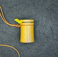 Image 1 of Tube call Mud Cured Osage