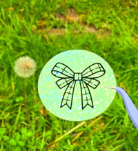 Image 1 of Green bow glitter circle die cut 