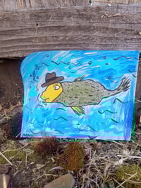Image 1 of Fish Swimming In Hat