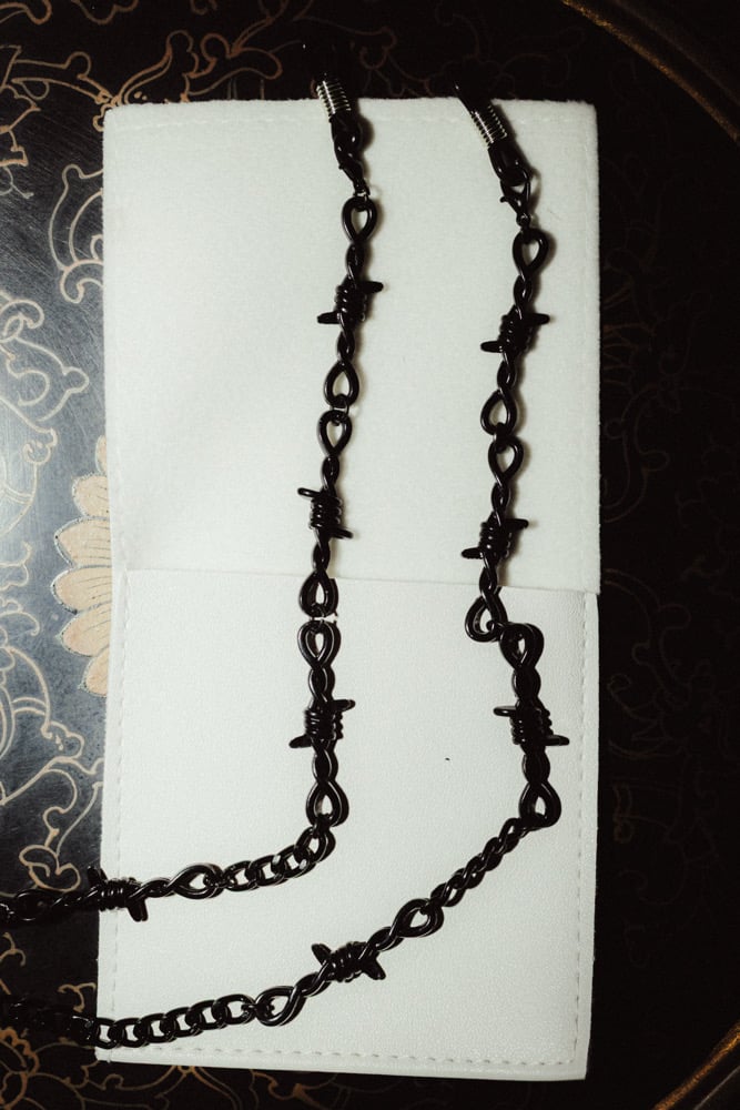 Image of black barbed wire