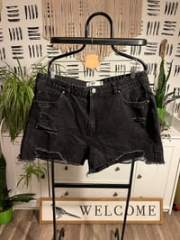 Image 1 of black distressed jeans shorts 