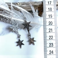 Image 4 of Handmade silver cosmic star dangly earrings. Celestial silver starry earrings. 