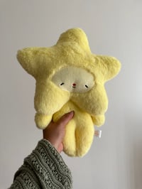 Image 1 of Yellow Factory Star Baby plushie 