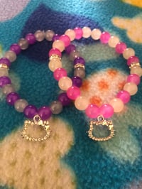 Image 1 of hello kitty 🩷💜