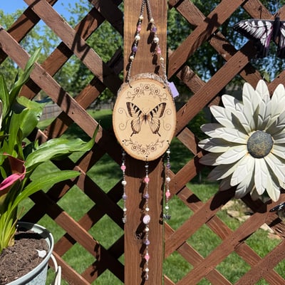Image of divine butterfly hanging beaded wood art