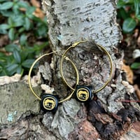 Image of “Winking” Black & Gold Hoops