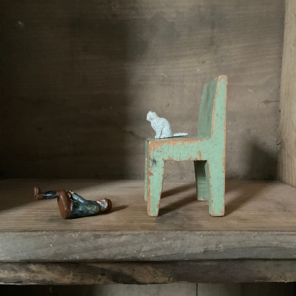 Image of Man,Cat & Chair