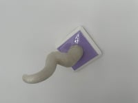 Image 1 of Single Blue Glow in the Dark Tentacle on Lilac and White Square Base