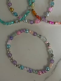 Image 14 of Warm Serene Brushstrokes Dinosaur Tumbler Accessory Set | Bow, Straw Bauble & Bracelets