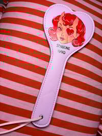 Image 1 of Devil lady spanking paddle