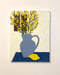 Image of Blue Jug and Small Yellow Flowers