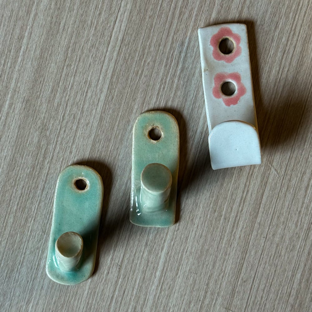 image of single hook wall hangers 