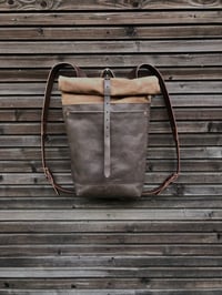 Image 5 of Leather backpack with waxed canvas roll to close top and double outside pocket