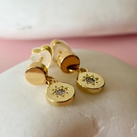 Image 1 of Little Circle and Star on a circular ear stud