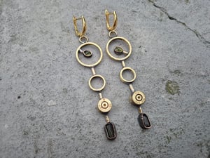 Long earrings with bullet casings and green stones 