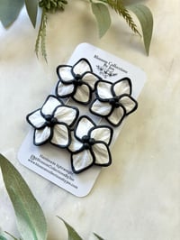 Image 2 of White and Black flowers 