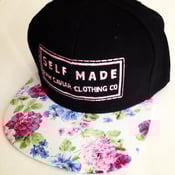Image of Raw Caviar pink patch stitch floral print bill