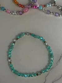 Image 15 of Warm Serene Brushstrokes Dinosaur Tumbler Accessory Set | Bow, Straw Bauble & Bracelets