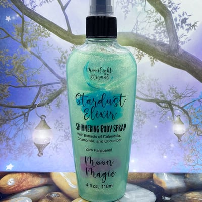 Image of Moon Magic Stardust Elixir. A sparkling body spray with fruity floral notes. 