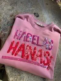 Image 2 of Suadoiro bordado a man. HABELAS HAINAS rosa. Varias tallas. Por encarga!