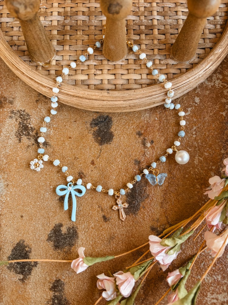 Image of Macey-blue cross