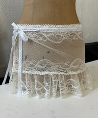 Jupe en dentelle de Calais écrue motif vague