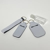 Image 1 of Hand Sanitizer Lip Stick Holder Wristlet Set