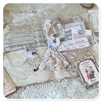 Image 2 of handmade fabric book full of vintage french lace samples