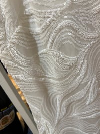 Image 5 of puller over with lace ribbon 