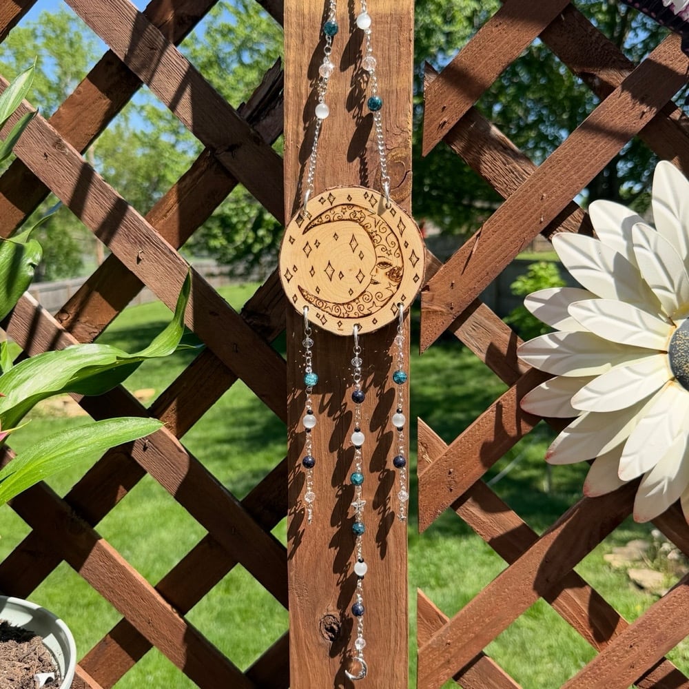 Image of face in the moon sun catcher 
