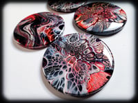 Image 2 of CRimSoN COasTerS (4)